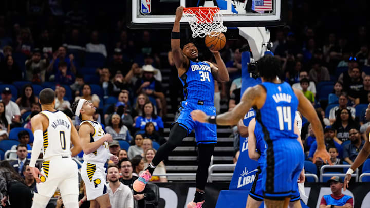 Feb 25, 2023; Orlando, Florida, USA; Orlando Magic center Wendell Carter Jr. (34) dunks the ball against the Indiana Pacers during the first quarter at Amway Center. Mandatory Credit: Rich Storry-Imagn Images
