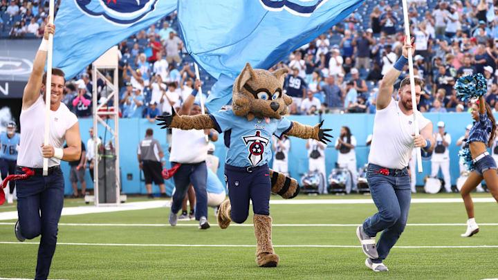 Aug 17, 2024; Nashville, Tennessee, USA; Tennessee Titans mascot T-Rac runs onto the field before the game against the Seattle Seahawks at Nissan Stadium. Mandatory Credit: Casey Gower-Imagn Images