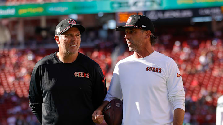 San Francisco 49ers quarterbacks coach Brian Griese (L) and head coach Kyle Shanahan (R)