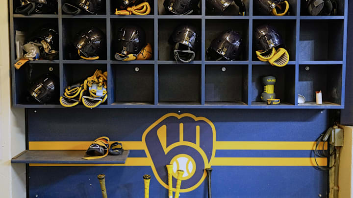 Apr 5, 2025; Milwaukee, Wisconsin, USA; General view of Milwaukee Brewers batting helmets in the dugout prior to the game against the Cincinnati Reds at American Family Field. Mandatory Credit: Jeff Hanisch-Imagn Images Apr 5, 2025; Milwaukee, Wisconsin, USA; General view of Milwaukee Brewers batting helmets in the dugout prior to the game against the Cincinnati Reds at American Family Field. Mandatory Credit: Jeff Hanisch-Imagn Images