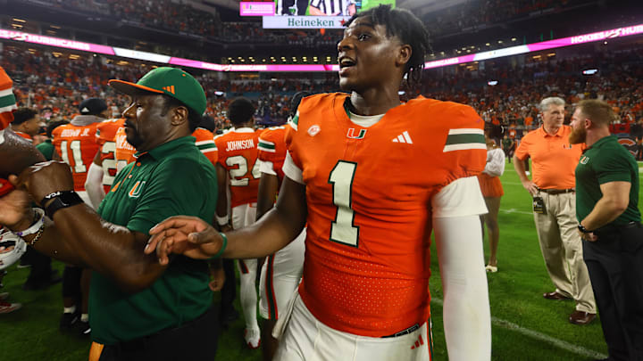 Sep 27, 2024; Miami Gardens, Florida, USA; Miami Hurricanes quarterback Cam Ward (1) looks on from the field as officials review the last play of the game against the Virginia Tech Hokies at Hard Rock Stadium. Mandatory Credit: Sam Navarro-Imagn Images