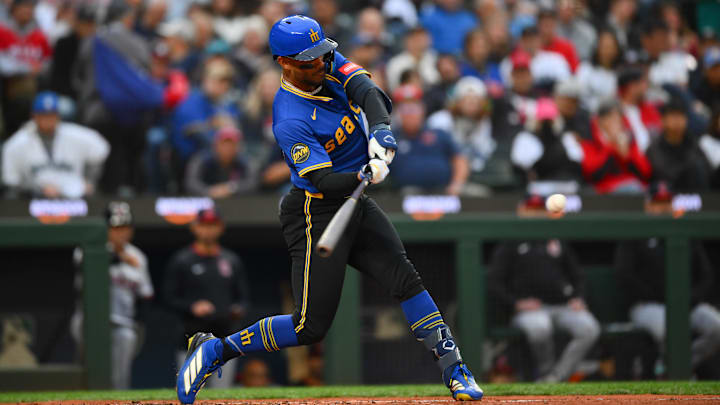 Seattle Mariners center fielder Julio Rodriguez hits a double during a game against the Cleveland Guardians on June 13 at T-Mobile Park. Seattle Mariners center fielder Julio Rodriguez hits a double during a game against the Cleveland Guardians on June 13 at T-Mobile Park.