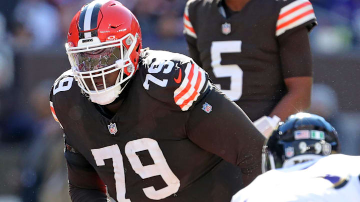 Cleveland Browns offensive tackle Dawand Jones (79) eyes down Baltimore Ravens linebacker Tavius Robinson (95) during the first half of an NFL football game at Huntington Bank Field, Sunday, Oct. 27, 2024, in Cleveland, Ohio. Cleveland Browns offensive tackle Dawand Jones (79) eyes down Baltimore Ravens linebacker Tavius Robinson (95) during the first half of an NFL football game at Huntington Bank Field, Sunday, Oct. 27, 2024, in Cleveland, Ohio.