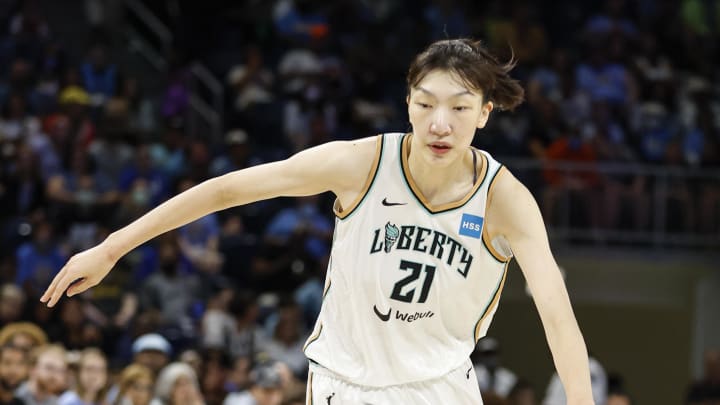 Aug 20, 2022; Chicago, Illinois, USA; New York Liberty center Han Xu (21) drives to the basket against the Chicago Sky during the second half of Game 2 of the first round of the WNBA playoffs at Wintrust Arena. Mandatory Credit: Kamil Krzaczynski-USA TODAY Sports Aug 20, 2022; Chicago, Illinois, USA; New York Liberty center Han Xu (21) drives to the basket against the Chicago Sky during the second half of Game 2 of the first round of the WNBA playoffs at Wintrust Arena. Mandatory Credit: Kamil Krzaczynski-USA TODAY Sports