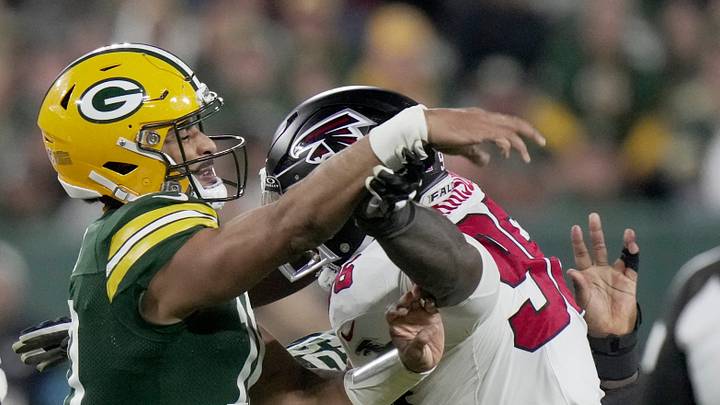 Green Bay Packers quarterback Jordan Love (10) is pressured by Atlanta Falcons defensive end Zach Harrison. Green Bay Packers quarterback Jordan Love (10) is pressured by Atlanta Falcons defensive end Zach Harrison.