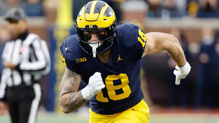 Nov 23, 2024; Ann Arbor, Michigan, USA;  Michigan Wolverines tight end Colston Loveland (18) runs a route against the Northwestern Wildcats at Michigan Stadium. Mandatory Credit: Rick Osentoski-Imagn Images