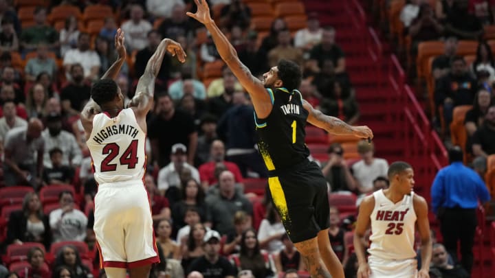 Dec 2, 2023; Miami, Florida, USA;  Indiana Pacers forward Obi Toppin (1) tips a shot by Miami Heat forward Haywood Highsmith (24) during the first half at Kaseya Center. Mandatory Credit: Jim Rassol-USA TODAY Sports