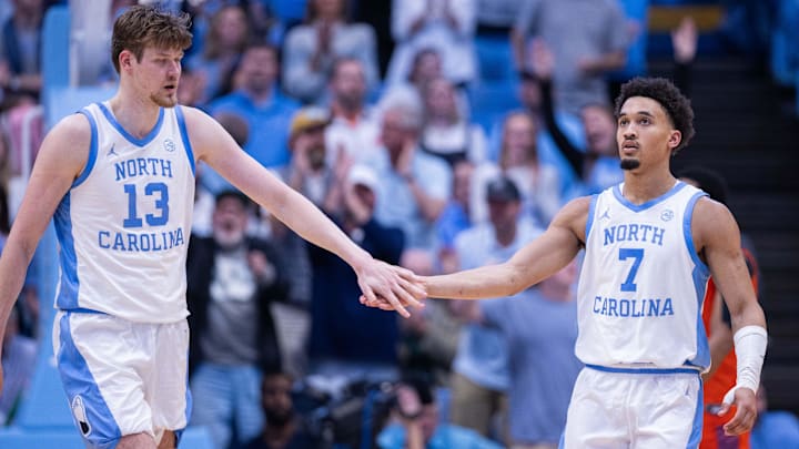 North Carolina Tar Heels center Henri Veesaar (13) celebrates with guard Seth Trimble (7)