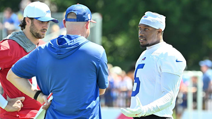 Jul 23, 2025; Rochester, NY, USA; Buffalo Bills wide receiver Joshua Palmer (5) talks with quarterback Josh Allen (17) and offensive coordinator Joe Brady during training camp at St. John Fisher University.
