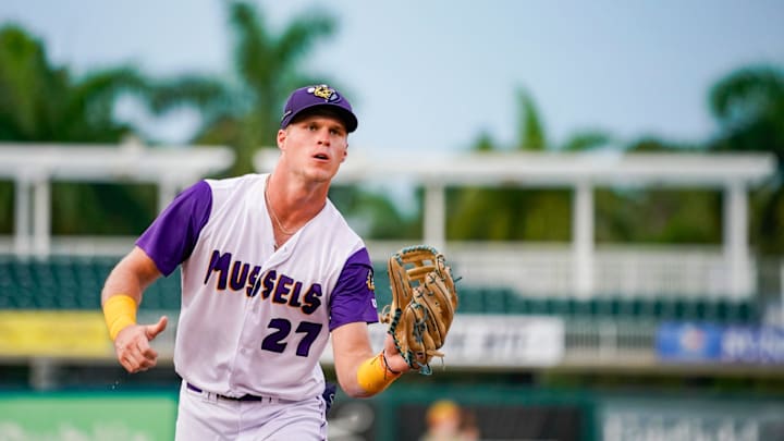 Fort Myers Mighty Mussels outfielder Walker Jenkins (27) catches a ball from the dugout during the second inning of a game against the Tampa Tarpons at Hammond Stadium in Fort Myers, Fla., on  June 28, 2024.