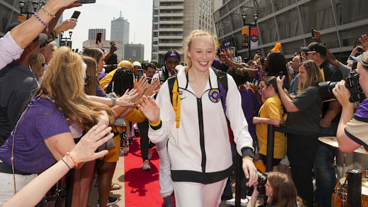 Apr 2, 2023; Dallas, TX, USA; LSU Lady Tigers forward Emily Ward high-fives fans prior to their game against the Iowa Hawkeyes during the final round of the Women's Final Four NCAA tournament at the American Airlines Center. Mandatory Credit: Kirby Lee-Imagn Images