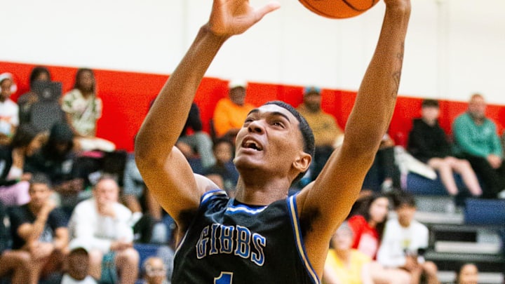 Gibbs High School center Isaiah Medina (1) takes it in for a layup in the first half. Gibbs High School played St. Thomas Aquinas in the championship game of the Kingdom of the Sun at Vanguard High School in Ocala, FL on Monday, December 30, 2024. St. Thomas Aquinas defeated the Raiders 80-64. [Doug Engle/Ocala Star Banner]
