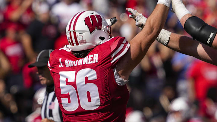 Oct 5, 2024; Madison, Wisconsin, USA; Wisconsin Badgers offensive linemen Joe Brunner (56) celebrates following a touchdown during the third quarter against the Purdue Boilermakers at Camp Randall Stadium. Oct 5, 2024; Madison, Wisconsin, USA; Wisconsin Badgers offensive linemen Joe Brunner (56) celebrates following a touchdown during the third quarter against the Purdue Boilermakers at Camp Randall Stadium.
