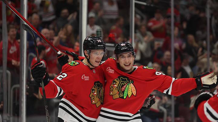 Apr 2, 2025; Chicago, Illinois, USA; Chicago Blackhawks right wing Ilya Mikheyev (95) and defenseman Alex Vlasic (72) celebrate a first period goal against the Colorado Avalanche  at United Center. Mandatory Credit: Talia Sprague-Imagn Images