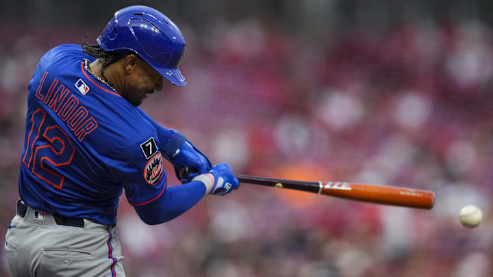 Sep 5, 2025; Cincinnati, Ohio, USA; New York Mets shortstop Francisco Lindor (12) hits a double against the Cincinnati Reds in the fourth inning at Great American Ball Park. Mandatory Credit: Aaron Doster-Imagn Images Sep 5, 2025; Cincinnati, Ohio, USA; New York Mets shortstop Francisco Lindor (12) hits a double against the Cincinnati Reds in the fourth inning at Great American Ball Park. Mandatory Credit: Aaron Doster-Imagn Images