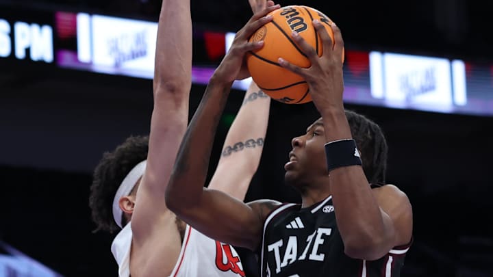 Mississippi State Bulldogs forward Jamarion Davis-Fleming (0) prepares to shoot against Utah Utes forward James Okonkwo (32) during the first half at Delta Center. Mississippi State Bulldogs forward Jamarion Davis-Fleming (0) prepares to shoot against Utah Utes forward James Okonkwo (32) during the first half at Delta Center.