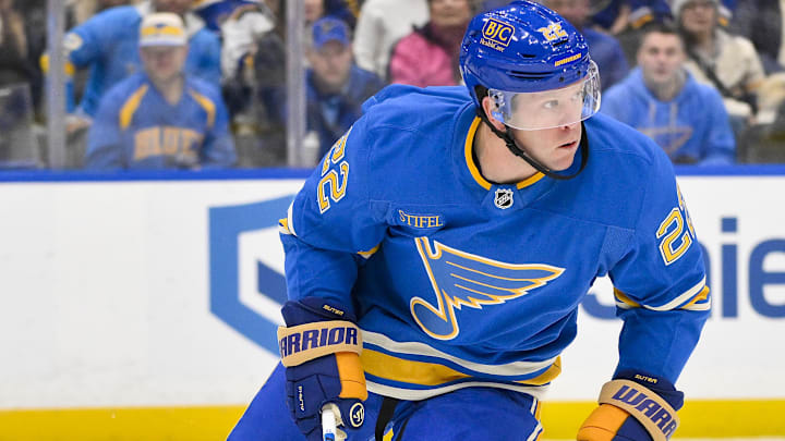 Jan 11, 2025; St. Louis, Missouri, USA;  St. Louis Blues defenseman Ryan Suter (22) controls the puck against the Columbus Blue Jackets during the first period at Enterprise Center. Mandatory Credit: Jeff Curry-Imagn Images