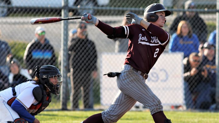 Colt Emerson hits a two-run double during a high school game against West Muskingum on March 31, 2023.
