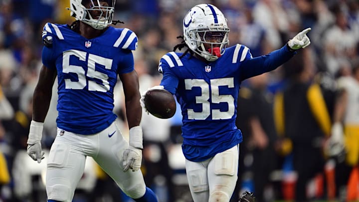 Sep 29, 2024; Indianapolis, Indiana, USA; Indianapolis Colts cornerback Chris Lammons (35) and defensive end Isaiah Land (55) celebrate a fumble recovery during the second half against the Pittsburgh Steelers at Lucas Oil Stadium. Mandatory Credit: Marc Lebryk-Imagn Images Sep 29, 2024; Indianapolis, Indiana, USA; Indianapolis Colts cornerback Chris Lammons (35) and defensive end Isaiah Land (55) celebrate a fumble recovery during the second half against the Pittsburgh Steelers at Lucas Oil Stadium. Mandatory Credit: Marc Lebryk-Imagn Images