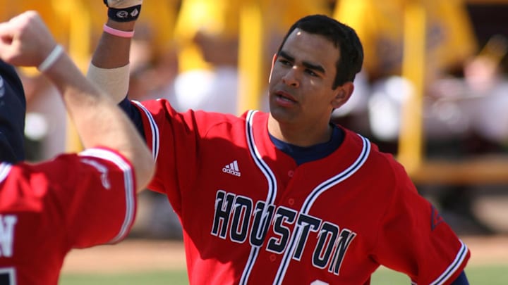 Feb 19, 2006; Tempe, AZ, USA; Houston Cougars infielder (8) Dustin Kingsbury celebrates after hitting a solo home run against the Arizona State Sun Devils during the 3rd inning at Packard Stadium. Mandatory Credit: Rick Scuteri-Imagn Images Copyright Rick Scuteri Feb 19, 2006; Tempe, AZ, USA; Houston Cougars infielder (8) Dustin Kingsbury celebrates after hitting a solo home run against the Arizona State Sun Devils during the 3rd inning at Packard Stadium. Mandatory Credit: Rick Scuteri-Imagn Images Copyright Rick Scuteri