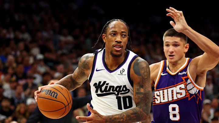 Oct 22, 2025; Phoenix, Arizona, USA; Sacramento Kings guard DeMar DeRozan (10) drives to the basket against Phoenix Suns guard Grayson Allen (8) during the second half at the Mortgage Matchup Center. Mandatory Credit: Mark J. Rebilas-Imagn Images Oct 22, 2025; Phoenix, Arizona, USA; Sacramento Kings guard DeMar DeRozan (10) drives to the basket against Phoenix Suns guard Grayson Allen (8) during the second half at the Mortgage Matchup Center. Mandatory Credit: Mark J. Rebilas-Imagn Images
