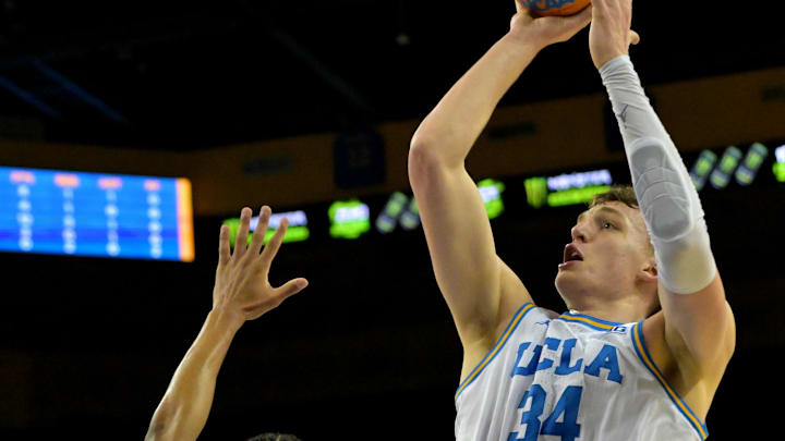 Feb 3, 2026; Los Angeles, California, USA;  UCLA Bruins forward Tyler Bilodeau (34) shoots over Rutgers Scarlet Knights guard Tariq Francis (0) in the first half at Pauley Pavilion presented by Wescom Financial. Mandatory Credit: Jayne Kamin-Oncea-Imagn Images