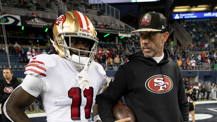 San Francisco 49ers wide receiver Brandon Aiyuk (L) and head coach Kyle Shanahan (R)