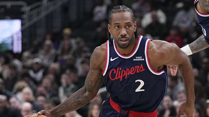 Mar 29, 2026; Milwaukee, Wisconsin, USA; LA Clippers forward Kawhi Leonard (2) drives to the basket against the Milwaukee Bucks at Fiserv Forum. 