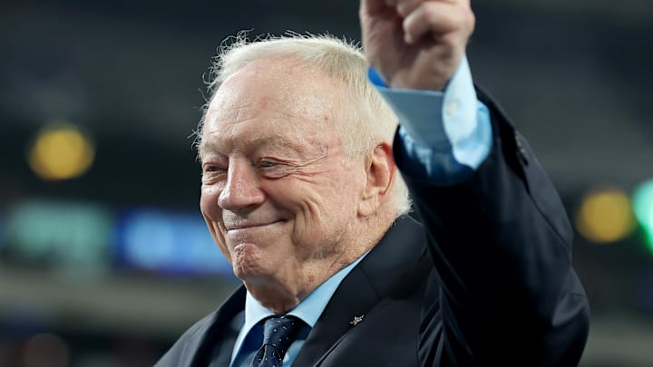 Dallas Cowboys owner Jerry Jones leaves the field before a game against the New York Giants.