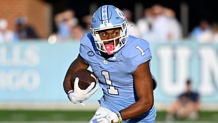 Sep 7, 2024; Chapel Hill, North Carolina, USA; North Carolina Tar Heels wide receiver Jordan Shipp (1)  with the ball in the fourth quarter at Kenan Memorial Stadium. Mandatory Credit: Bob Donnan-Imagn Images] 