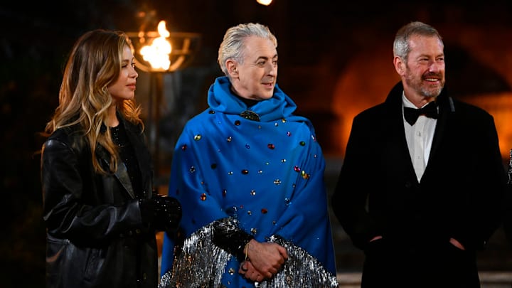THE TRAITORS -- "The Day of Reckoning is Upon Us" Episode 311 -- Pictured: (l-r) Gabby Windey, Alan Cumming, Lord Ivar Mountbatten -- (Photo by: Euan Cherry/Peacock)