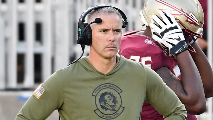 Nov 2, 2024; Tallahassee, Florida, USA; Florida State Seminoles head coach Mike Norvell looks on from the sideline after the North Carolina Tarheels score a final touchdown in the fourth quarter at Doak S. Campbell Stadium. Mandatory Credit: Robert Myers-Imagn Images