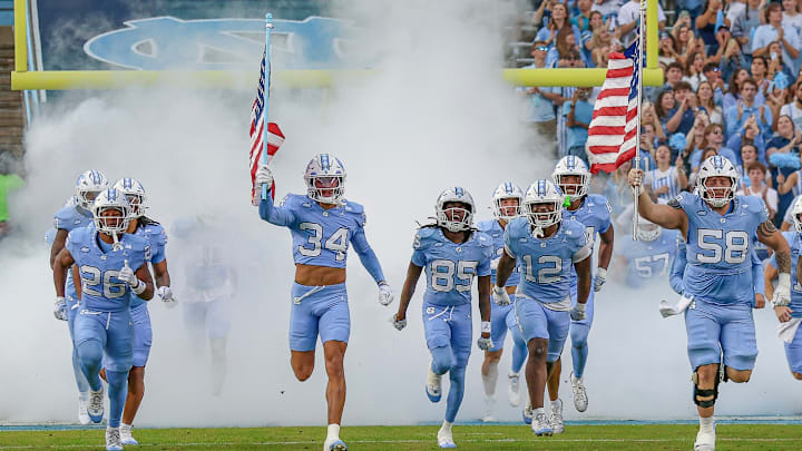 North Carolina running on the field before its game vs. Stanford; Nov. 8, 2025 North Carolina running on the field before its game vs. Stanford; Nov. 8, 2025