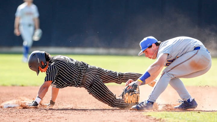 Serra puts on a late, low tag on a Mitty baserunner in an April 11, 2025 game  in San Jose. Serra, the No. 1 seed in the CCS Division 1 tournament, won 14-3. Mitty is the fourth seed in Division 2. 