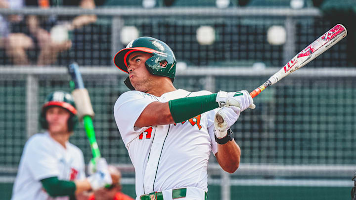 Miami Hurricanes third baseman Daniel Cuvet is smashing a home run against Lehigh.