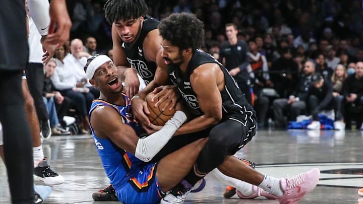 Jan 5, 2024; Brooklyn, New York, USA;  Oklahoma City Thunder guard Shai Gilgeous-Alexander (2) and