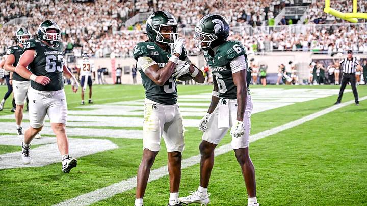 Michigan State’s Rodney Bullard Jr., left, celebrates his touchdown with Fredrick Moore during the fourth quarter in the game against Toledo on Friday, Sept. 4, 2026, at Spartan Stadium in East Lansing. Michigan State’s Rodney Bullard Jr., left, celebrates his touchdown with Fredrick Moore during the fourth quarter in the game against Toledo on Friday, Sept. 4, 2026, at Spartan Stadium in East Lansing.