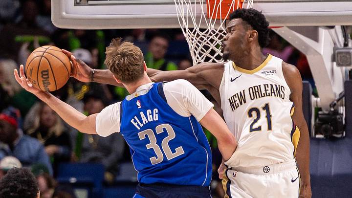 Mar 16, 2026; New Orleans, Louisiana, USA;  New Orleans Pelicans center Yves Missi (21) knocks the ball from Dallas Mavericks forward Cooper Flagg (32) during the second half at Smoothie King Center. Mandatory Credit: Stephen Lew-Imagn Images