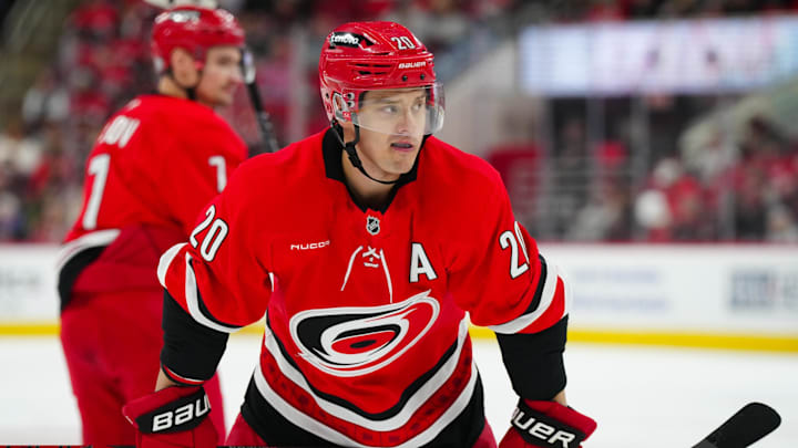 Mar 25, 2025; Raleigh, North Carolina, USA;  Carolina Hurricanes center Sebastian Aho (20) looks on against the Nashville Predators during the third period at Lenovo Center. Mandatory Credit: James Guillory-Imagn Images