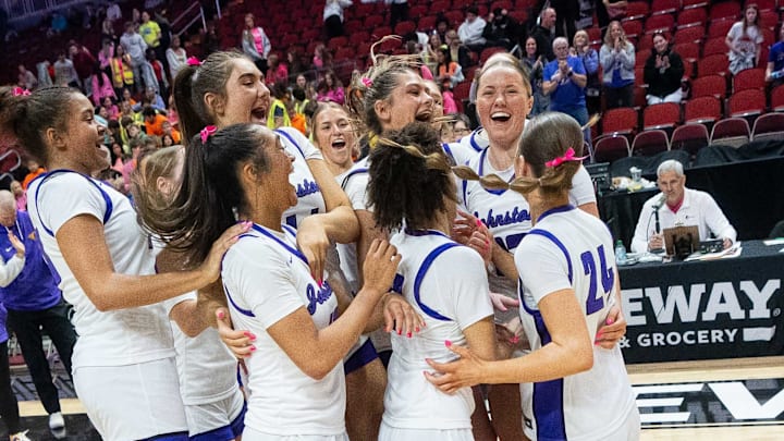 The Johnston girls basketball team celebrate their 5A quarterfinal win over Iowa City Liberty on Monday, March 3, 2025, at Wells Fargo Arena.