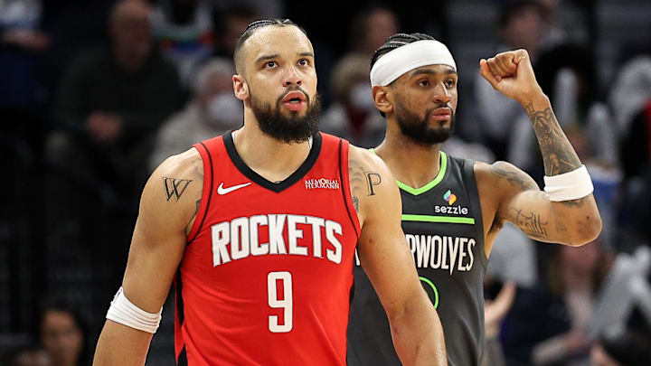 Feb 6, 2025; Minneapolis, Minnesota, USA; Minnesota Timberwolves guard Nickeil Alexander-Walker (9) celebrates against Houston Rockets forward Dillon Brooks (9) during the fourth quarter at Target Center. Mandatory Credit: Matt Krohn-Imagn Images