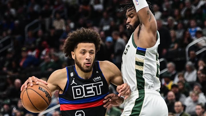 Nov 2, 2022; Milwaukee, Wisconsin, USA; Detroit Pistons guard Cade Cunningham (2) drives to the basket against Milwaukee Bucks guard Wesley Matthews (23) in the third quarter at Fiserv Forum. Mandatory Credit: Benny Sieu-Imagn Images