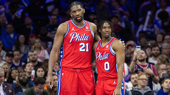 Apr 12, 2024; Philadelphia, Pennsylvania, USA; Philadelphia 76ers center Joel Embiid (21) and guard