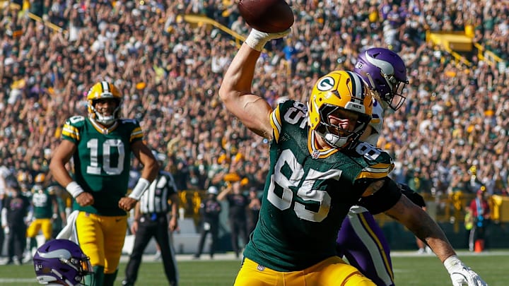 Green Bay Packers tight end Tucker Kraft (85) spikes the ball after catching a pass to score a 2-point conversion against the Minnesota Vikings on Sunday, September 29, 2024, at Lambeau Field in Green Bay, Wis. The Vikings won the game, 31-29. Green Bay Packers tight end Tucker Kraft (85) spikes the ball after catching a pass to score a 2-point conversion against the Minnesota Vikings on Sunday, September 29, 2024, at Lambeau Field in Green Bay, Wis. The Vikings won the game, 31-29.
