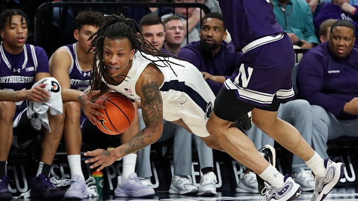 Penn State Nittany Lions guard Ace Baldwin Jr. (1) tries to maintain control after being fouled during the first half against the Northwestern Wildcats at Bryce Jordan Center. 