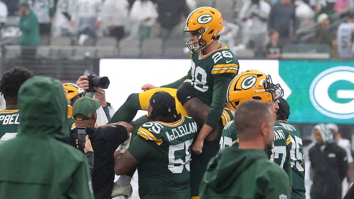 Sep 20, 2026; East Rutherford, New Jersey, USA;  Green Bay Packers kicker Trey Smack (28) is lifted in the air by teammates after kicking a 26-yard gaming winning field goal during overtime against the New York Jets at MetLife Stadium.  Mandatory Credit: Brad Penner-Imagn Images