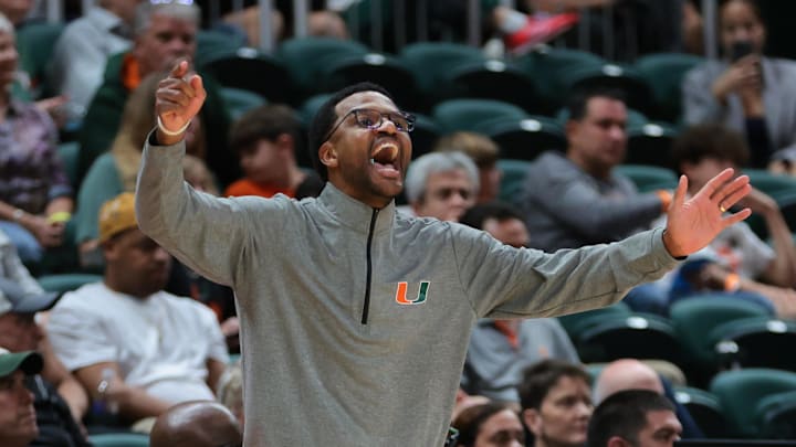 Nov 3, 2025; Coral Gables, Florida, USA; Miami Hurricanes head coach Jai Lucas reacts against the Jacksonville Dolphins during the second half at Watsco Center. Mandatory Credit: Sam Navarro-Imagn Images