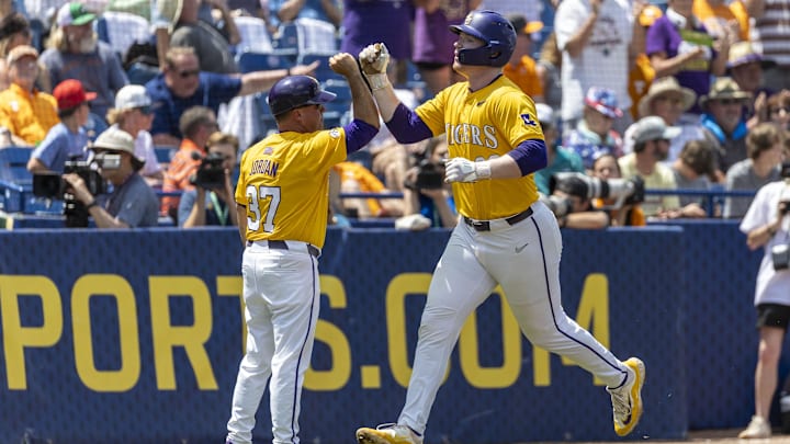 May 26, 2024; Hoover, AL, USA; LSU Tigers infielder Jared Jones (22) jogs the bases after his solo home run against the Tennessee Volunteers during the championship game between Tennessee and LSU at the SEC Baseball Tournament at Hoover Metropolitan Stadium. Mandatory Credit: Vasha Hunt-Imagn Images