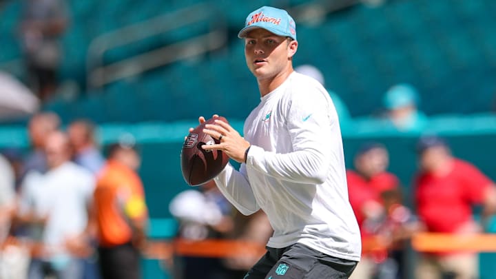 Sep 14, 2025; Miami Gardens, Florida, USA; Miami Dolphins quarterback Zach Wilson (0) warms up before a game against the New England Patriots at Hard Rock Stadium. Mandatory Credit: Nathan Ray Seebeck-Imagn Images Sep 14, 2025; Miami Gardens, Florida, USA; Miami Dolphins quarterback Zach Wilson (0) warms up before a game against the New England Patriots at Hard Rock Stadium. Mandatory Credit: Nathan Ray Seebeck-Imagn Images
