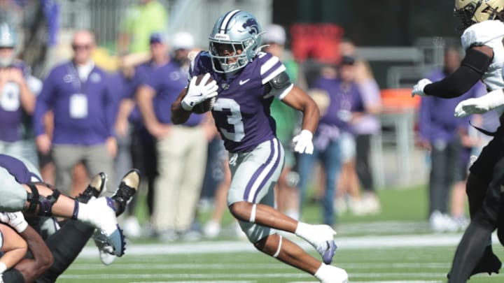 Kansas State Wildcats running back Dylan Edwards (3) runs the ball during the first half of the game against UCF Knights at Bill Snyder Family Stadium on Sept. 27, 2025.
